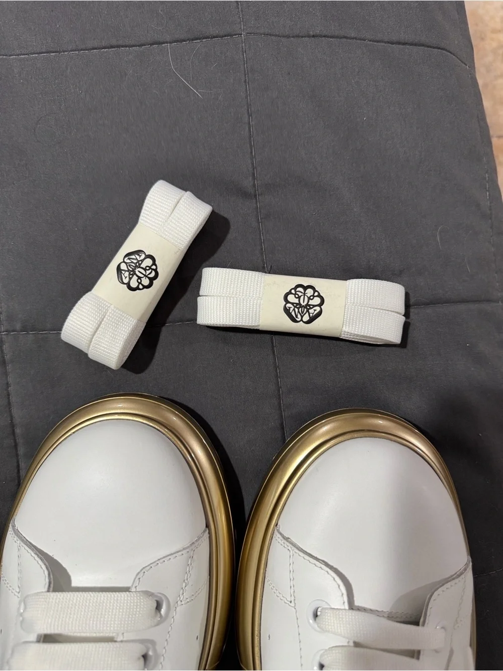 Alexander McQueen White Sneakers with Metallic Gold Sole